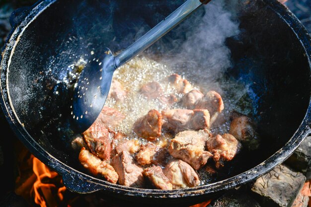 High angle view of meat in cooking pan