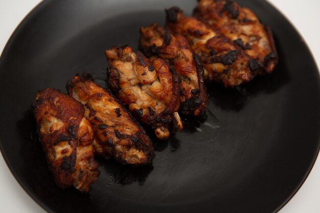 Photo high angle view of meat in cooking pan