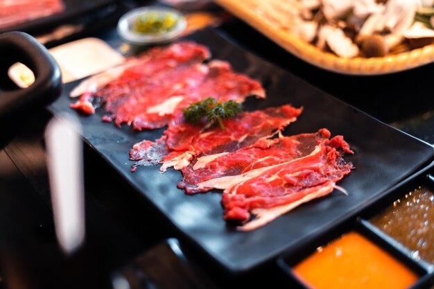 High angle view of meat in plate on table