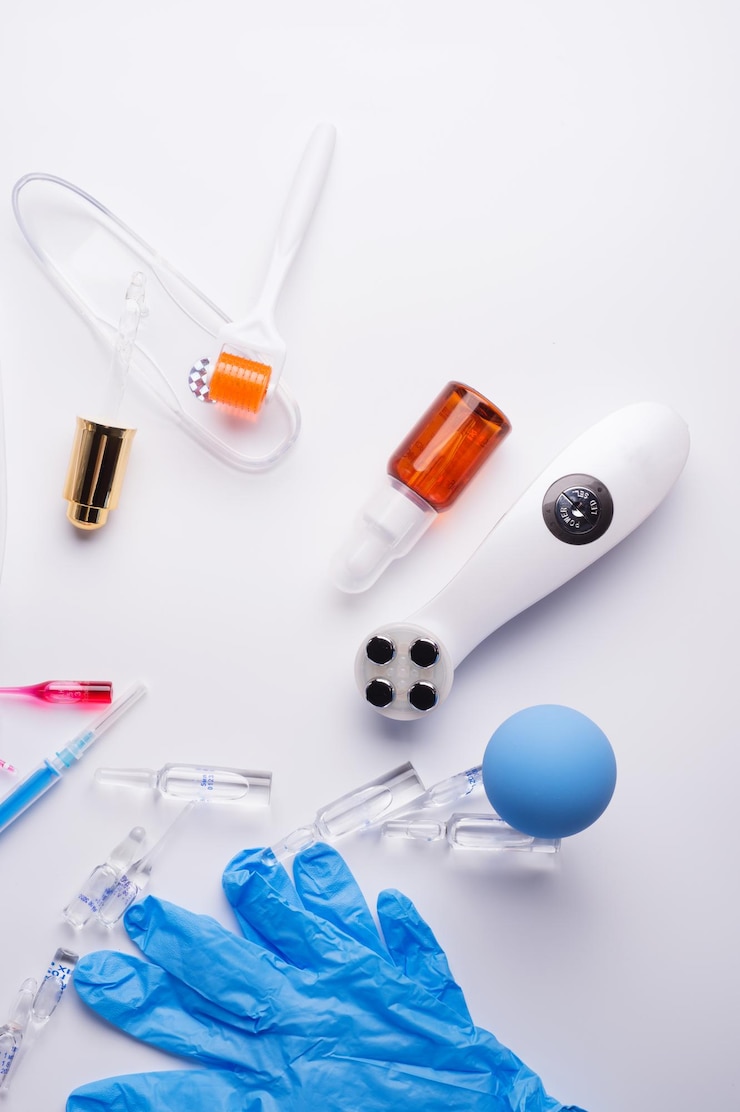 फोटो high angle view of medical equipment against white background