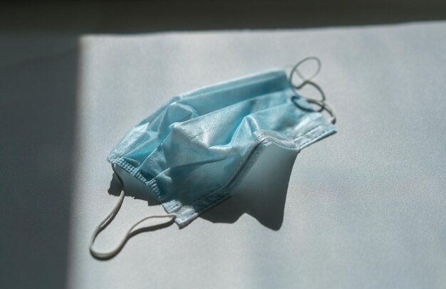 high angle view of medical mask on table
