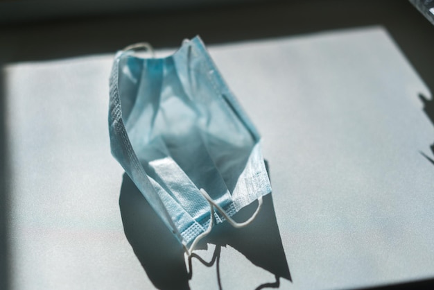 high angle view of medical mask on table