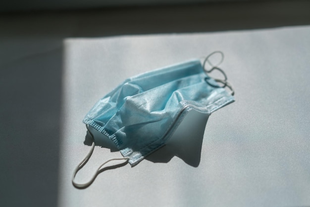 high angle view of medical mask on table