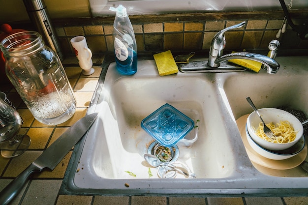 High angle view of messy kitchen sink