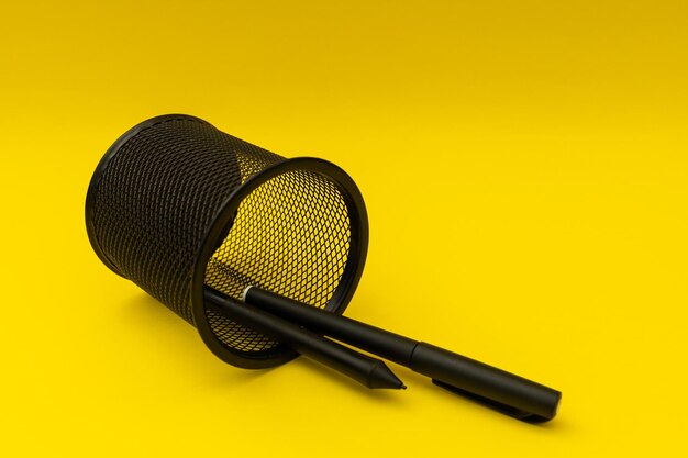 High angle view of microphone against yellow background
