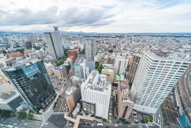 High angle view of modern buildings in city against sky