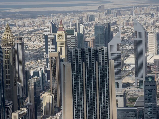 High angle view of modern buildings in city against sky