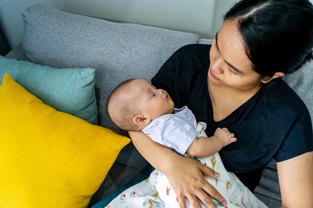 High angle view of mother and daughter at home