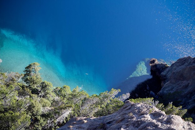 High angle view of mountain by sea