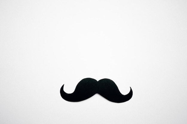 Photo high angle view of a moustache against white background