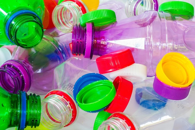 Photo high angle view of multi colored bottles on shelf