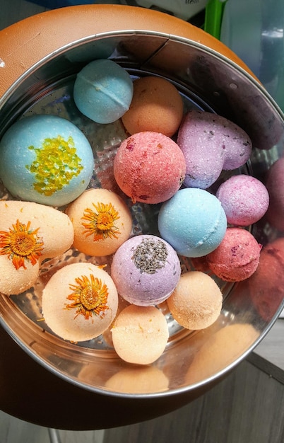 high angle view of multi colored candies in bowl on table