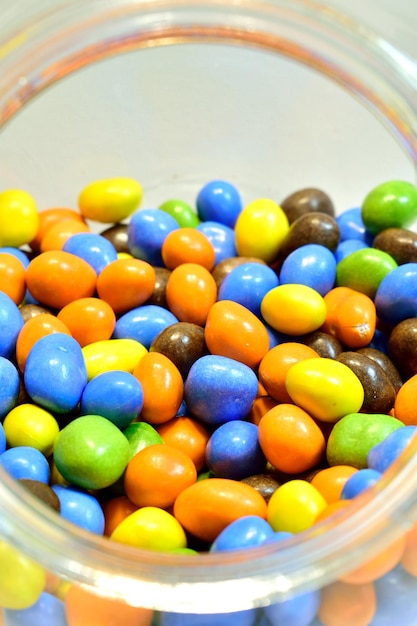 High angle view of multi colored candies in bowl