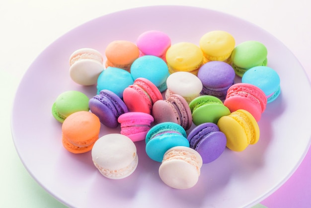 High angle view of multi colored candies in plate