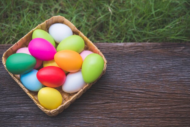 High angle view of multi colored eggs on table