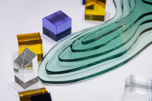 High angle view of multi colored glass mountain and buildings on table