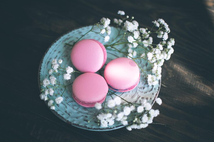 Photo high angle view of multi colored macarons on table