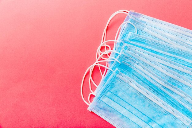 High angle view of multi colored pencils against blue background