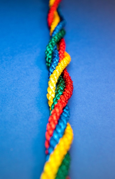 High angle view of multi colored pencils on blue table