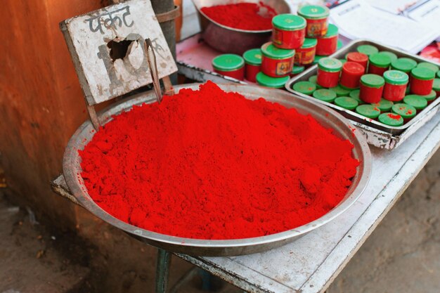 High angle view of multi colored powder in container