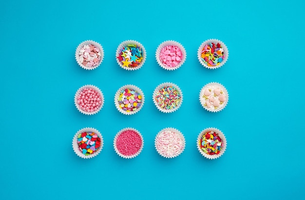High angle view of multi colored sprinkles on table