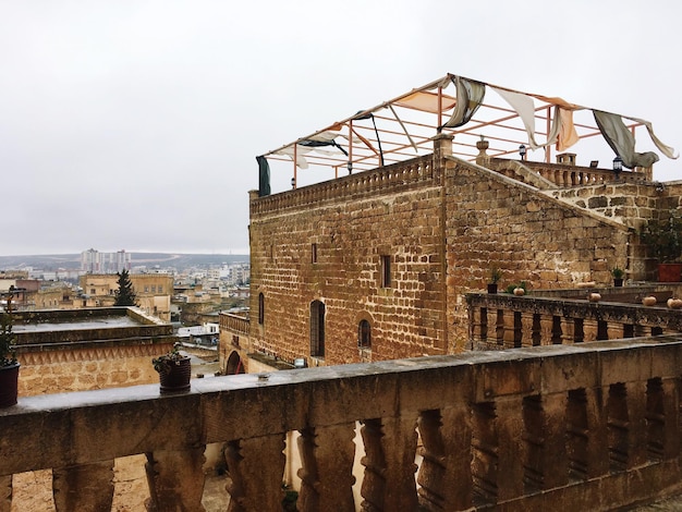 High angle view of old building against sky