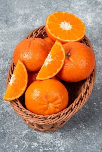 High angle view of orange fruits in basket