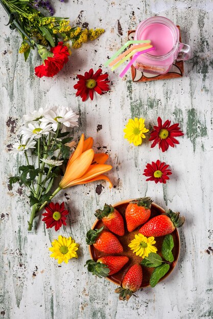 Photo high angle view of orange roses on wood