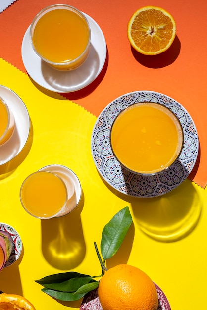 High angle view of orange tea on table