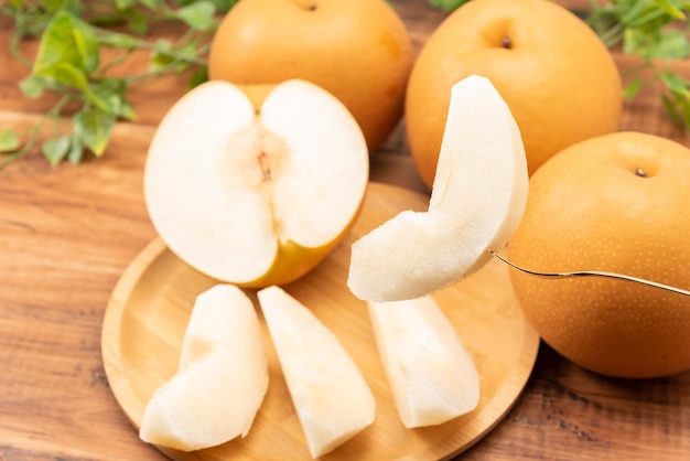 High angle view of oranges on cutting board