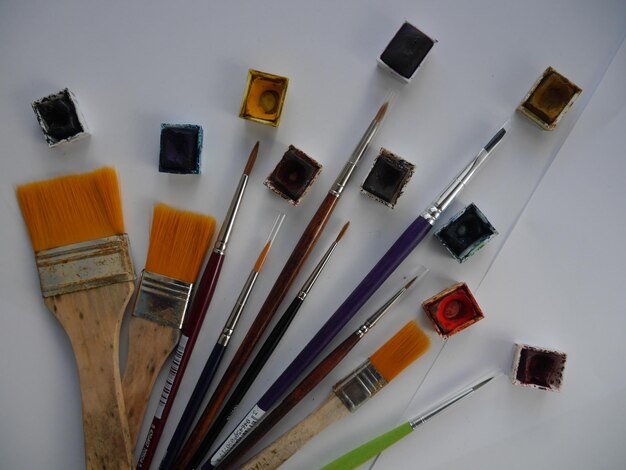 High angle view of paintbrushes on table