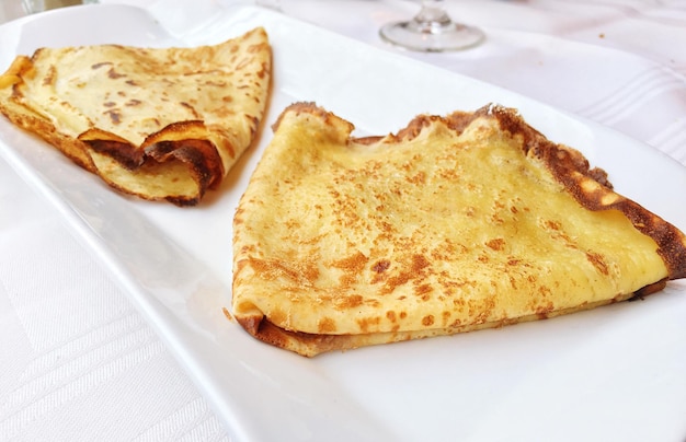 high angle view of pancakes in plate on table