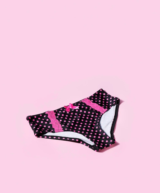 Photo high angle view of panties on pink background