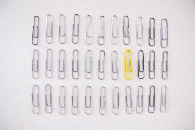 High angle view of paper clips on white background