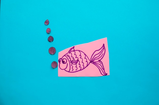 青い背景の紙絵の高角度のビュー