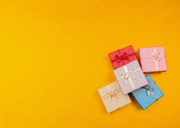 High angle view of paper toy against yellow background