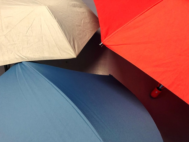 High angle view of parasol against blue sky