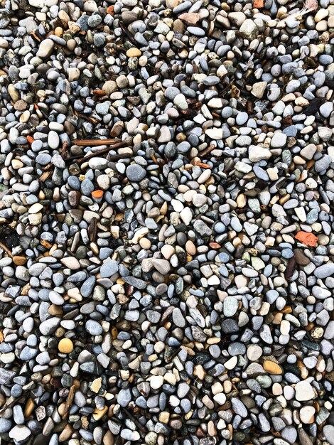 Photo high angle view of pebbles at beach