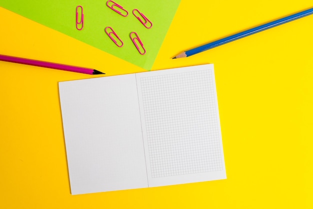 High angle view of pencil on book