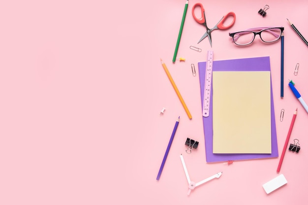 high angle view of pencils and book on table