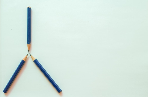 High angle view of pencils on white background