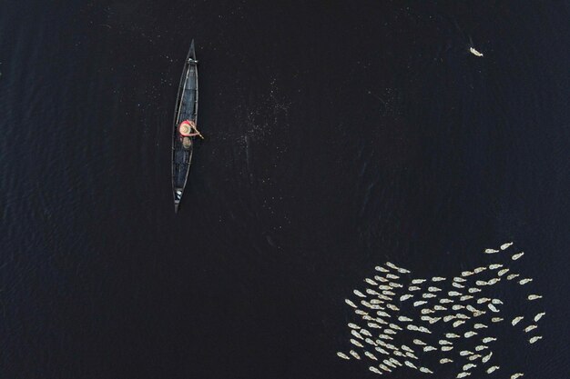 High angle view of people on boat in water