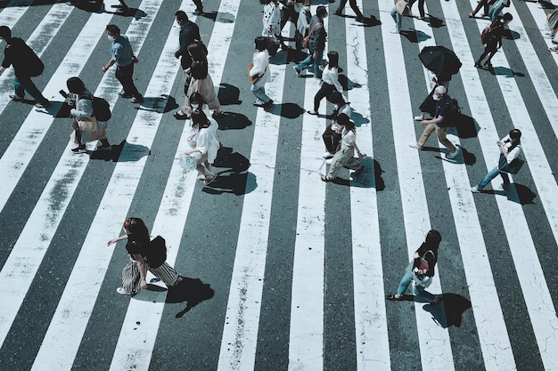 high angle view of people crossing road