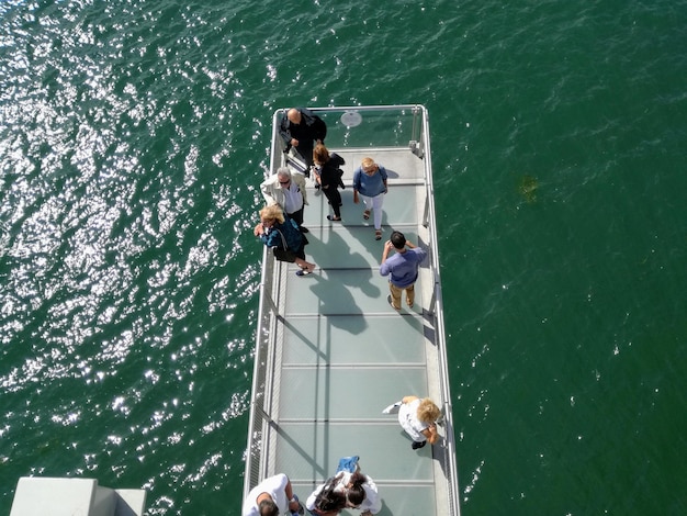 Photo high angle view of people enjoying in sea