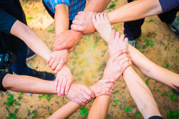 Photo high angle view of people hands