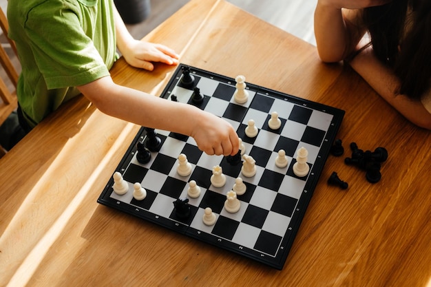 Photo high angle view of people playing on table