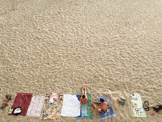 high angle view of people relaxing at beach