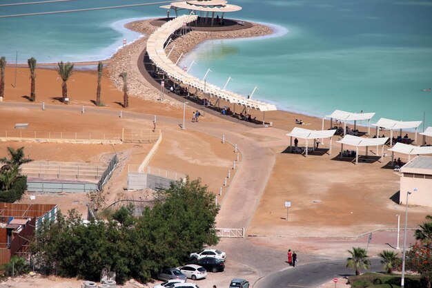 High angle view of people on shore against sky