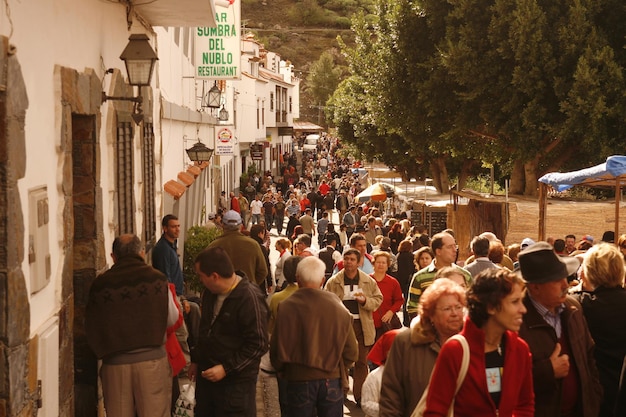 high angle view people walking on street by building