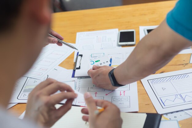 high angle view of people working on table